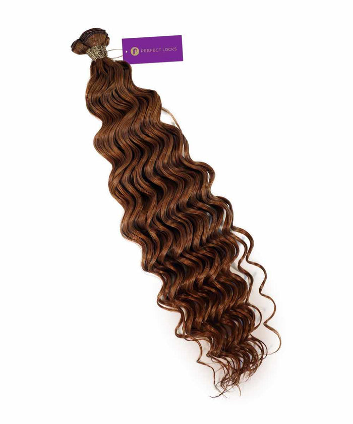 A bundle of Perfect Locks Curly Hybrid Weft Hair Extensions in Golden Brown  with loose waves and a purple tag on top.#color_golden-brown-(6)