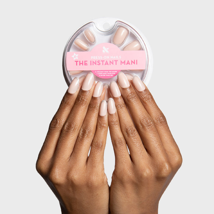 Exclamation Point Glitter French Press-Ons | Oval | Medium with medium oval shape and subtle sparkle silver glitter tips manicure