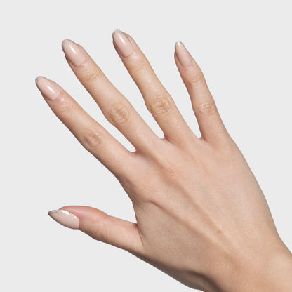 Exclamation Point Glitter French Press-Ons | Oval | Medium with nude base and sparkling silver glitter tips for at-home manicure
