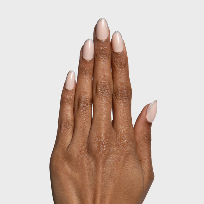Exclamation Point Glitter French Press-Ons | Oval | Medium with nude base and silver glitter tips on medium oval press-on nails