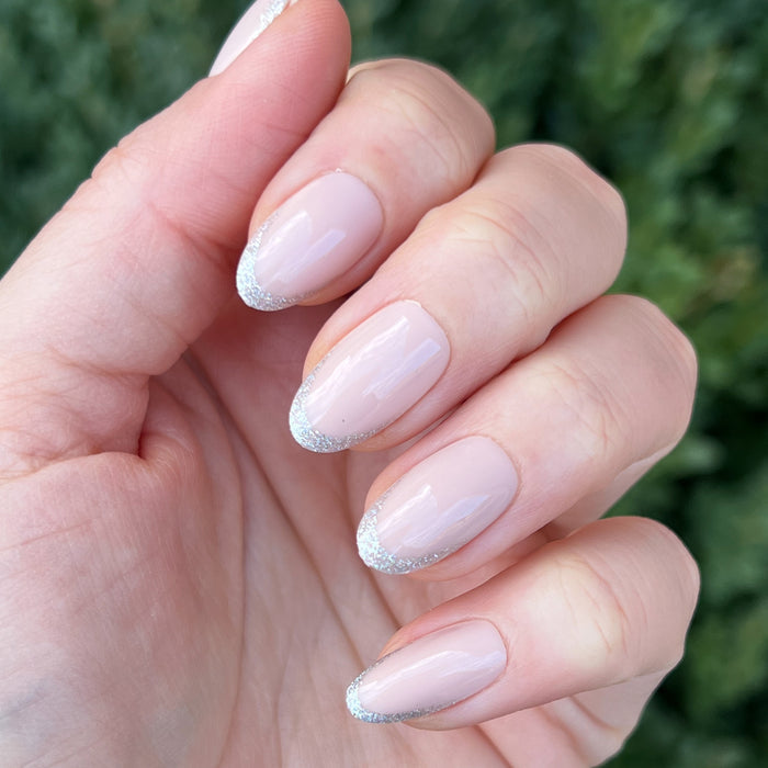 Exclamation Point Glitter French Press-Ons | Oval | Medium with medium oval press-on nails and sparkly silver glitter tips manicure