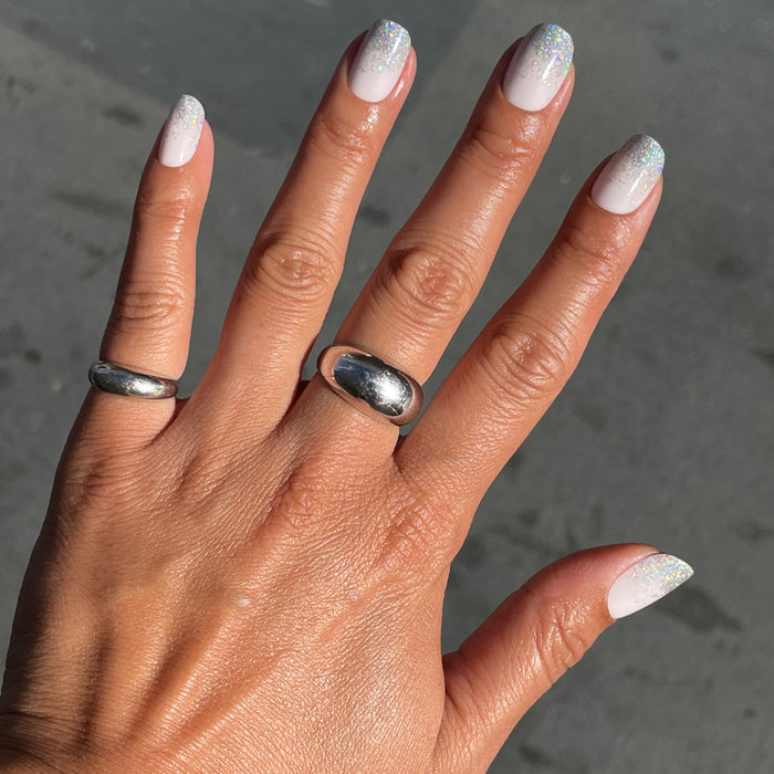 Exclamation Point Glitter Gradient Press-Ons | Squoval | Short with neutral base and shimmering silver glitter on short false nails manicure