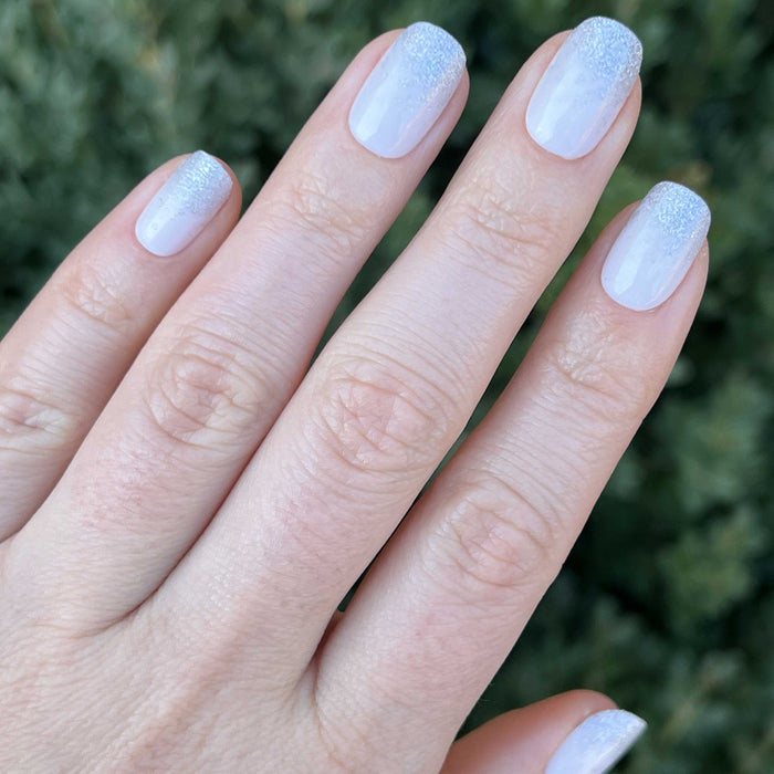 Exclamation Point Glitter Gradient Press-Ons | Squoval | Short with silver glitter fade on neutral base for a polished at-home mani