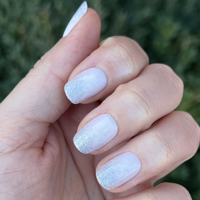 Exclamation Point Glitter Gradient Press-Ons | Squoval | Short with silver glitter fade on neutral base for classic at-home mani