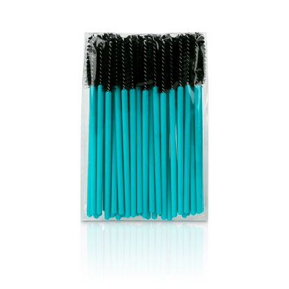 Teal eyelash mascara brush in a clear packaging case on a white background