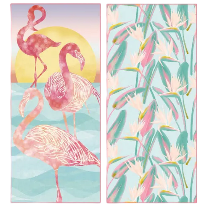 Two beach towels with flamingo and tropical leaf designs on a light blue background.