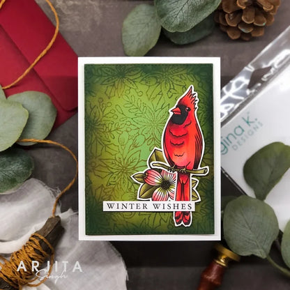 Gina K. Designs - Background Stamp - Poinsettia. Gina K. Designs - Background Stamp - Poinsettia. Poinsettia Background is a stamp set by Arjita Singh. This set is made of premium clear photopolymer and measures 6" X 8". Made in the USA. Available at Embellish Away located in Bowmanville Ontario Canada. Example by brand ambassador.