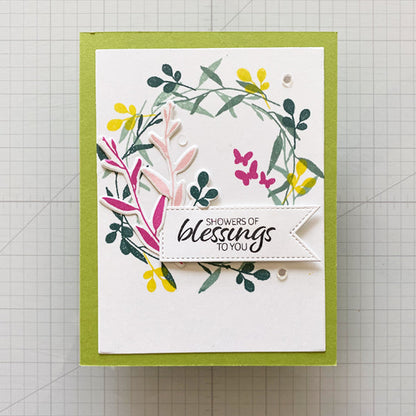Gina K. Designs - Stamp & Die Set - Showers Of Blessings. Showers of Blessings is a stamp and die set by Lisa Hetrick. This set is made of premium clear photopolymer and measures 6" X 8". Available at Embellish Away located in Bowmanville Ontario Canada. Example by Lisa Hetrick.