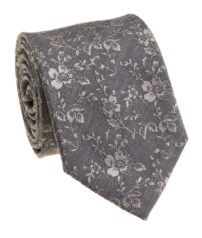 Floral patterned tie on a white background
