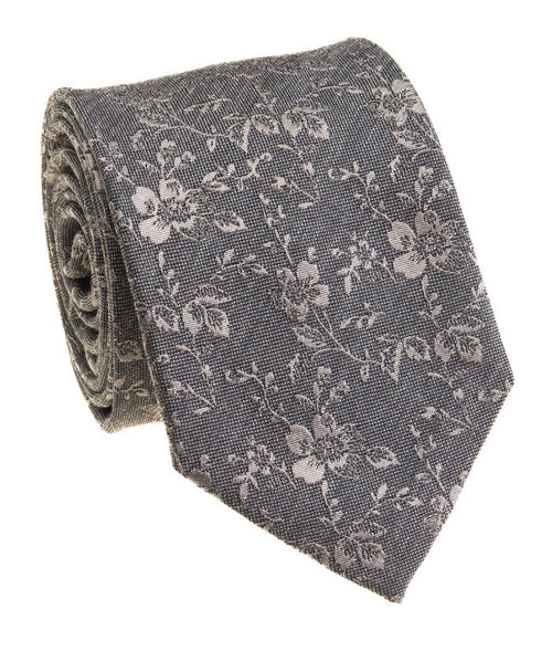 Floral patterned tie on a white background