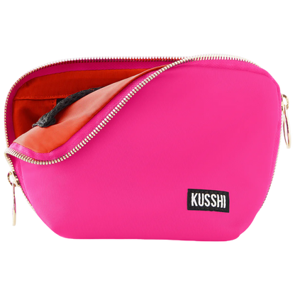 kusshi everyday makeup bag, bubble gum pink makeup bag, kusshi cosmetic bag, travel makeup bag, stylish toiletry bag, kusshi pink orange bag, everyday beauty bag, durable fabric makeup bag