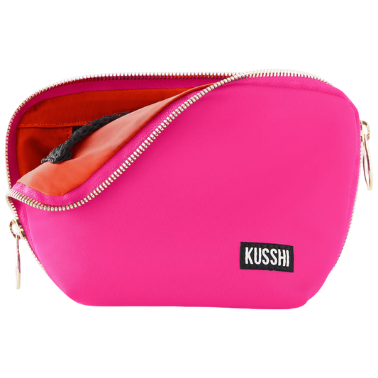 kusshi everyday makeup bag, bubble gum pink makeup bag, kusshi cosmetic bag, travel makeup bag, stylish toiletry bag, kusshi pink orange bag, everyday beauty bag, durable fabric makeup bag