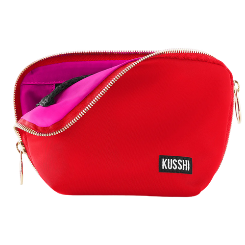 kusshi everyday makeup bag, candy apple red makeup bag, kusshi cosmetic bag, red pink makeup bag, travel makeup bag, stylish toiletry bag, kusshi red bag, everyday beauty bag