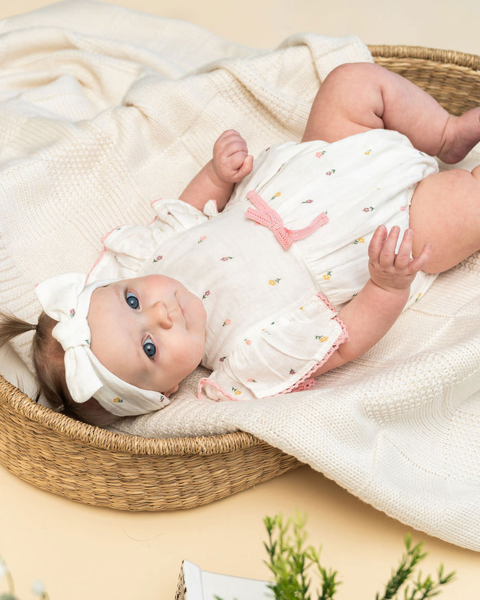 Margot Flower Baby Romper + Headband (Organic) Model Angle