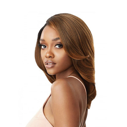 Model wearing OUTRE melted hairline synthetic lace front wig in honey brown side part layered shoulder length