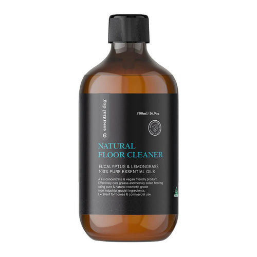 Bottle of natural floor cleaner with a black label on a white background.