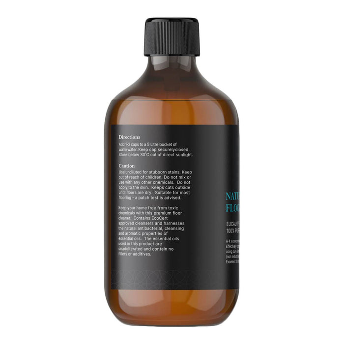 Brown bottle with black cap and label on a white background.