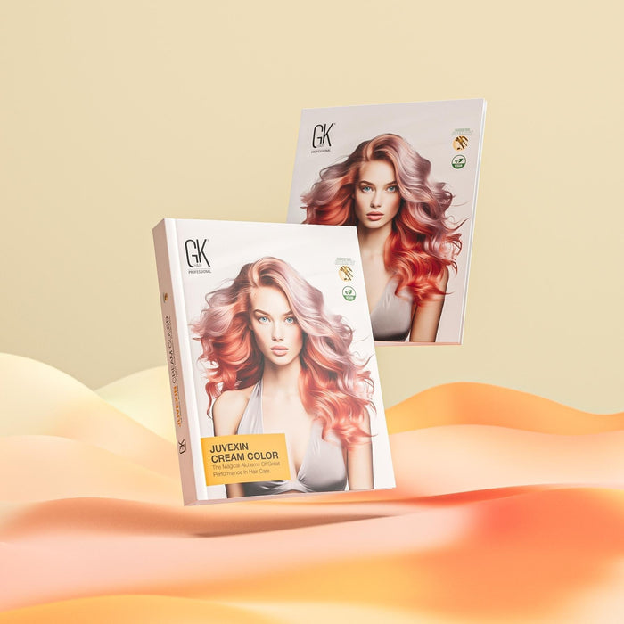 GK Hair Juvexin Cream Color swatch books over orange dunes, tagline The Magical Alchemy Of Great Performance In Hair Care