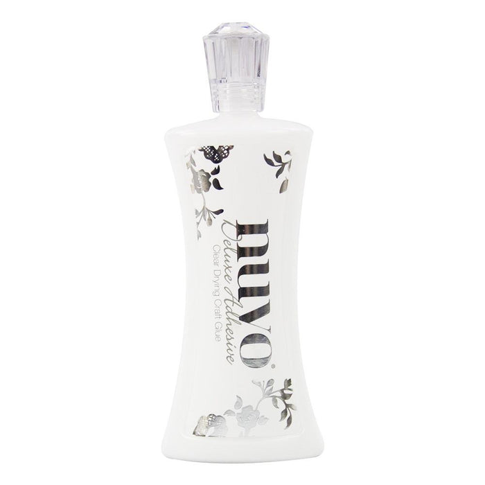 Perfect for all your crafting projects. Dries clear. This package contains 120ml of deluxe adhesive. Available at Embellish Away in Bowmanville Ontario Canada.