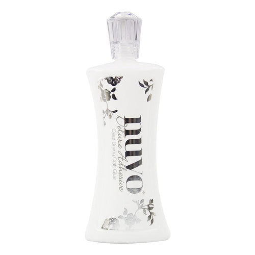 Perfect for all your crafting projects. Dries clear. This package contains 120ml of deluxe adhesive. Available at Embellish Away in Bowmanville Ontario Canada.