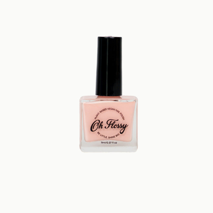 Oh Flossy Nail polish bottle for kids with black cap and peach nail polish