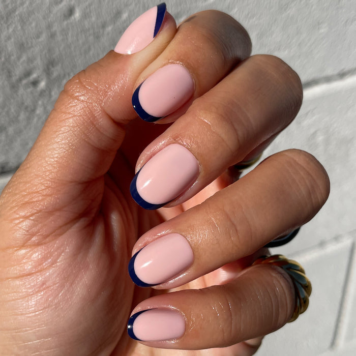 OMG Classic French Press-Ons | Round | Extra Short with pale pink base and deep navy tips on short round press-on nails manicure