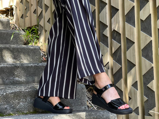 Quality European women's sandals. Made in Spain from soft patent leather. Comfortable wedge sandals in black.