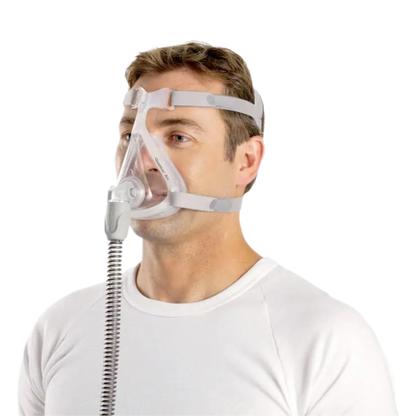 Image of a man using a Quattro™ Air Full Face Mask with Headgear from a quarter angle