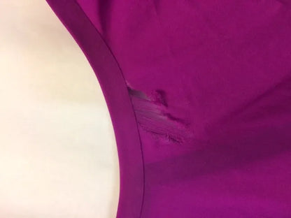 AK race suit repair service image showing a professional repair process for racing suits, emphasizing quick turnaround.