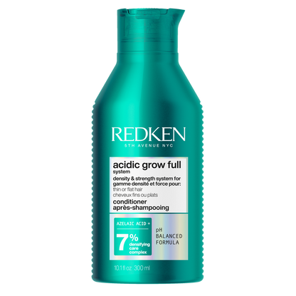 Redken bottle of acidic grow full product on a white background