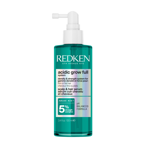 Redken bottle of acidic grow full hair product on a white background