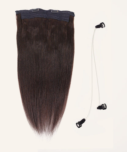 The Perfect Locks Relaxed Straight Perfect Crown Hair Extensions in natural black with top clips beside two clear elastic bands.#color_natural-black-(1B)