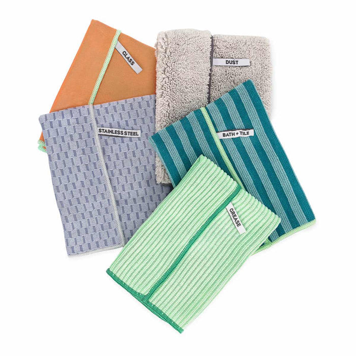 Set of cleaning cloths with different patterns and labels on a white background.
