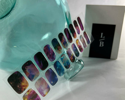 Cosmic Chic semi-cured gel nail wraps on a nail mock-up, alternate angle