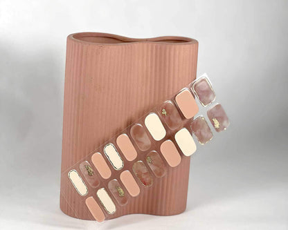 Gold Digger semi-cured gel nail wraps on a nail mock-up, close-up