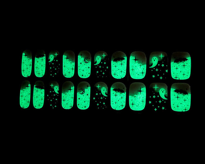 Halloween Glow gel nail wrap strip close-up, glow effect
