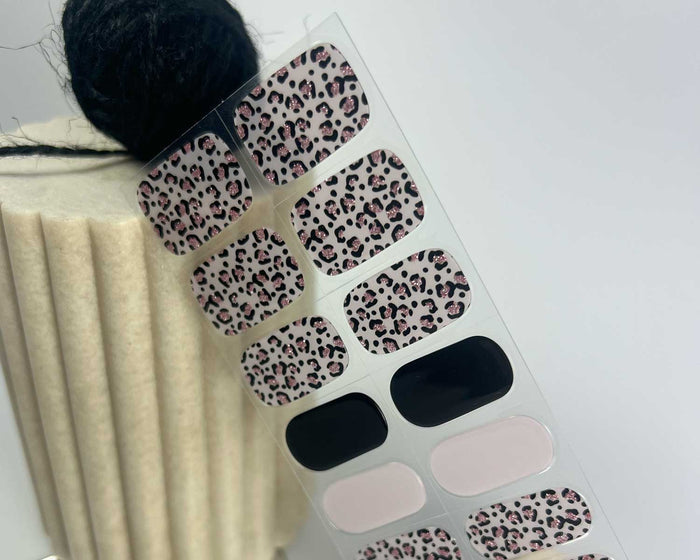 Midnight Meow semi-cured gel nail wraps on a nail mock-up, close-up