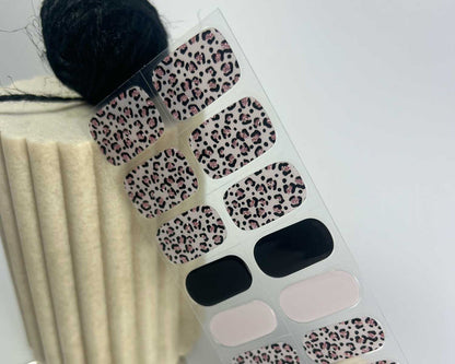 Midnight Meow semi-cured gel nail wraps on a nail mock-up, close-up