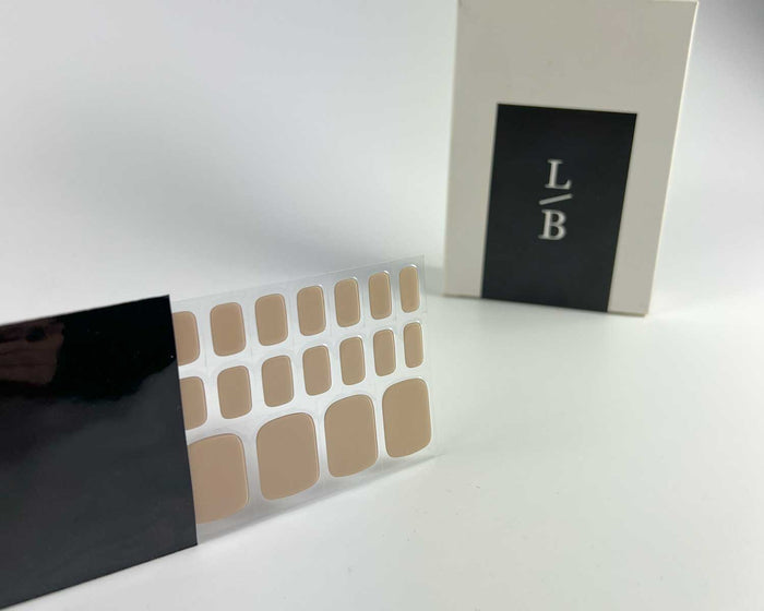 Oat Latte gel nail toe wrap strip on black background