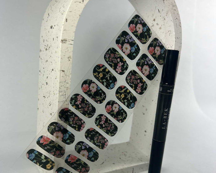 Secret Garden semi-cured gel nail wraps on a nail mock-up, angled view