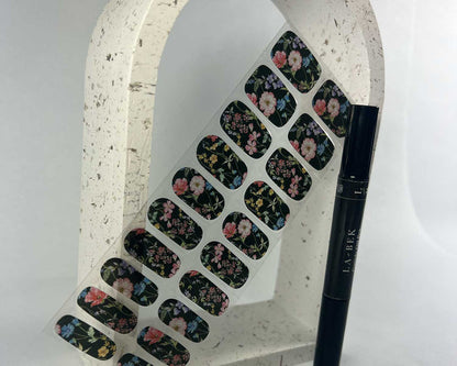 Secret Garden semi-cured gel nail wraps on a nail mock-up, angled view