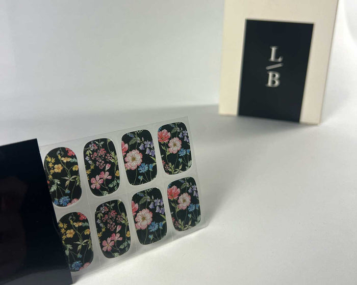 Secret Garden gel nail wrap strip close-up, angled view