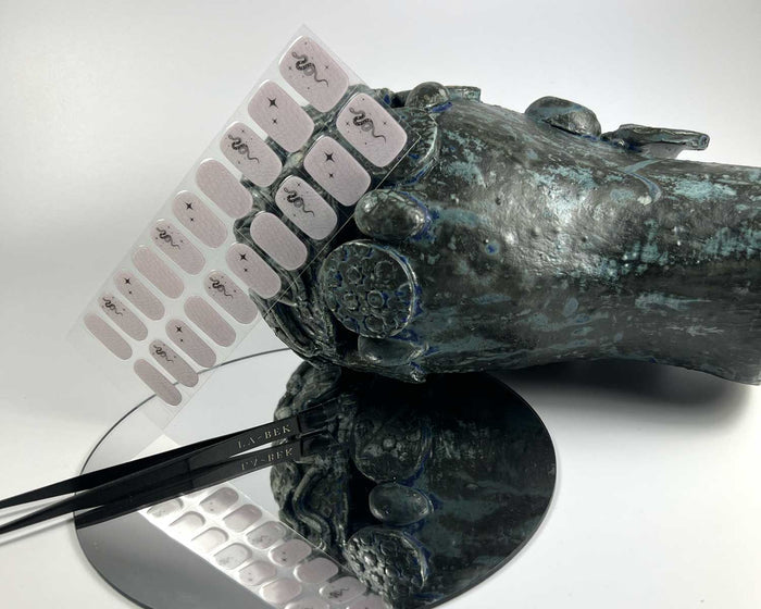 Snake Charmer semi-cured gel nail wraps on a nail mock-up