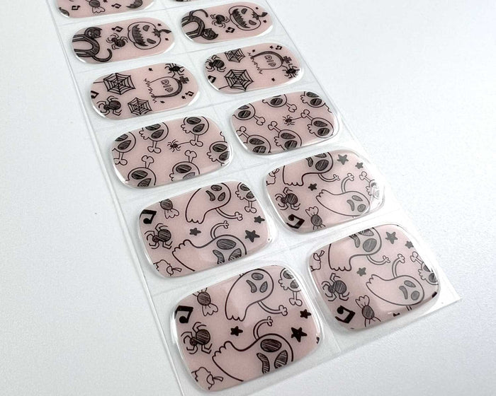 Spooky Sketches gel nail wrap strip close-up