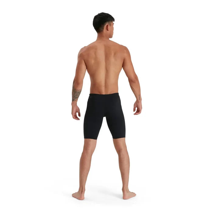 Speedo men's Eco Endurance+ jammer swimwear, close-up showing sleek black design and durable fabric for competitive swimming.