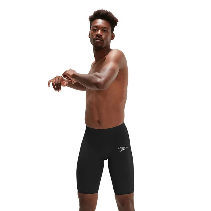 Black Speedo Men's Fastskin LZR Ignite Jammer swimming suit, close-up view showing sleek design and fabric texture.