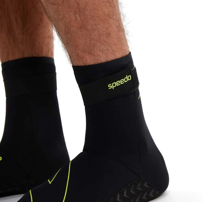 Black Speedo OW swim socks designed for swimming, featuring a snug fit and quick-drying material.