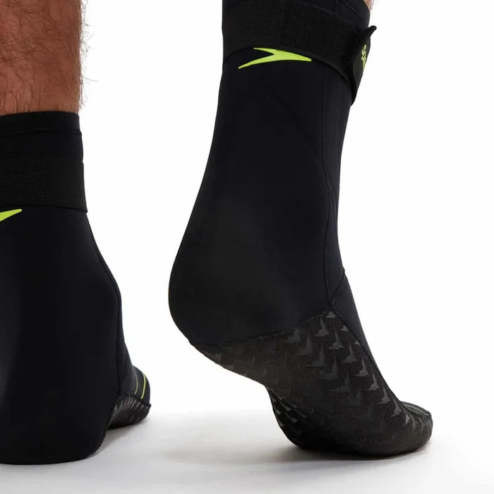 Black Speedo OW swim socks designed for water sports, featuring a snug fit and durable material for comfort and performance.
