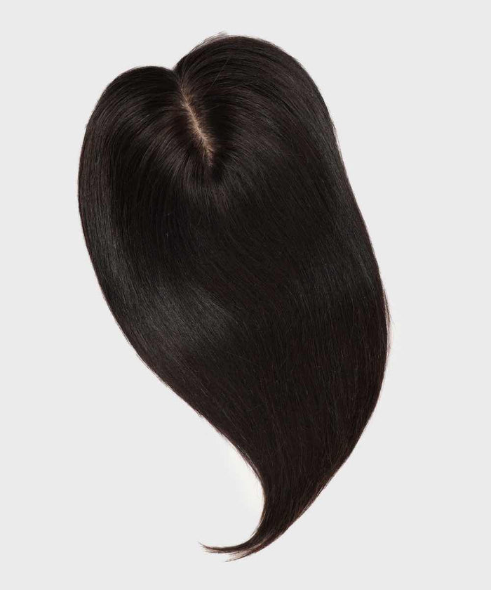 A Perfect Locks Straight Human Hair Crown Topper in natural black styled in a heart shape on a plain light background.#color_natural-black-(1B)