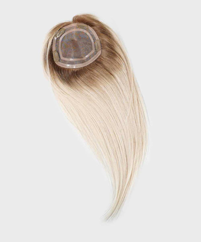The Perfect Locks Straight Human Hair Crown Topper in rooted ash blonde with lace base, clips, and dark-to-light blend on gray background.#color_rooted-ash-blonde-(8/60)